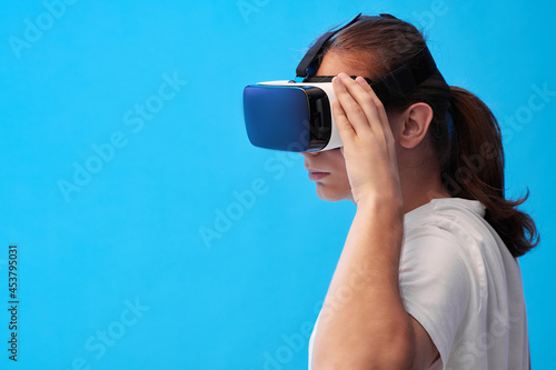 Young man using virtual reality headset. VR gadgets