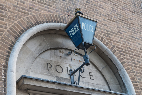 Old fashioned Police lantern at a Police station entrance in the UK.