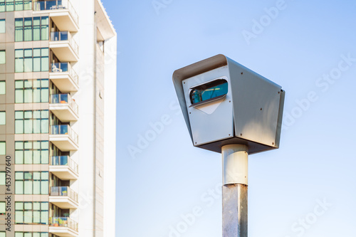 Modern stationary red light and speed camera in Adelaide city on a day photo