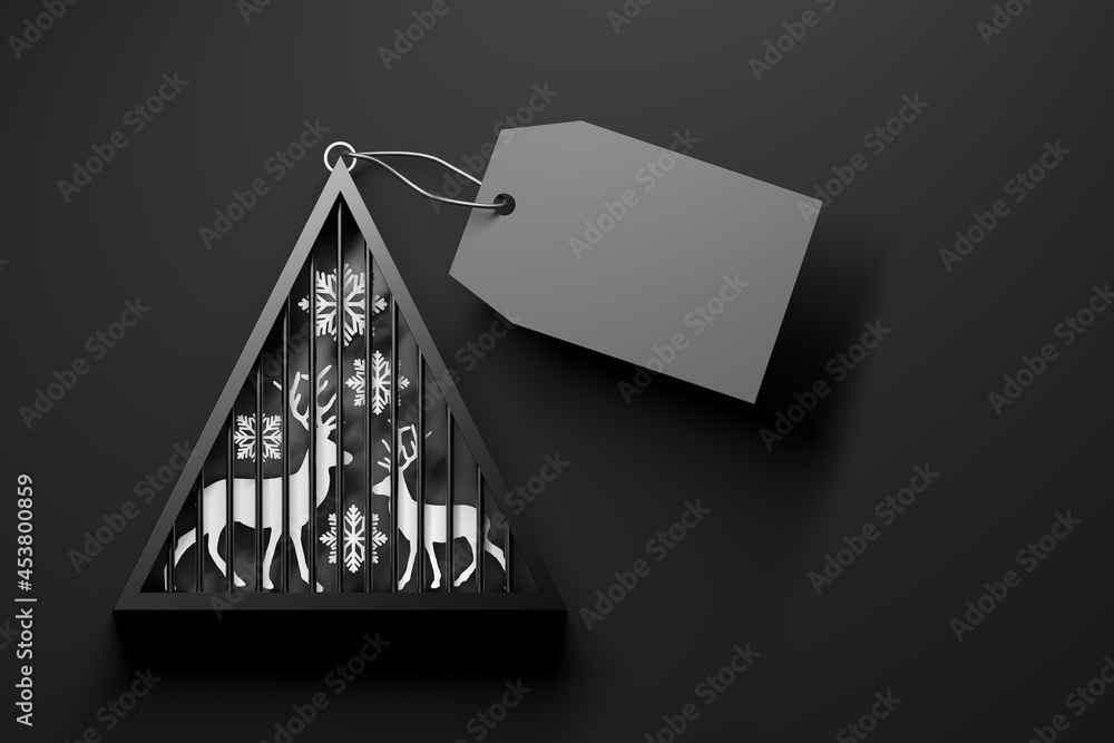Triangular geometric Christmas tree with snowflake and reindeer with greeting tag on black background Triangular geometric Christmas tree with snowflake and reindeer with greeting tag on black background
