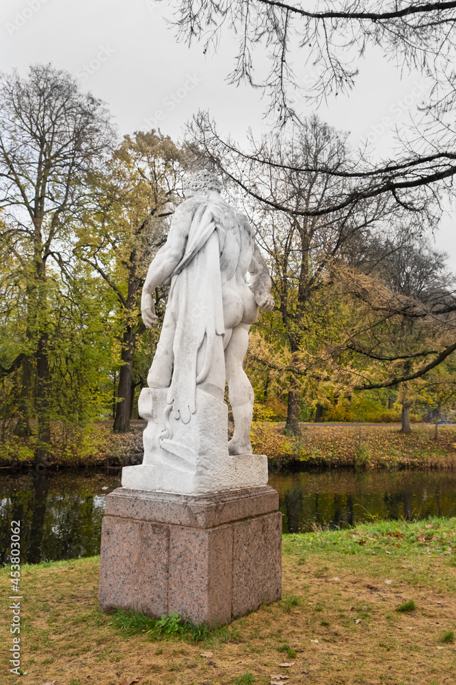 Russia, Saint-Petesburg, October 2020: Antique sculptures of man in the Central Park of Culture and Recreation on Yelagin Island in St. Petersburg