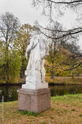 Russia, Saint-Petesburg, October 2020: Antique sculptures of man in the Central Park of Culture and Recreation on Yelagin Island in St. Petersburg