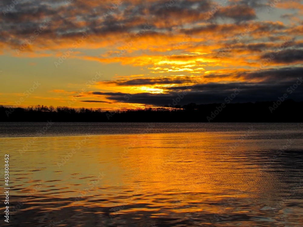 Sunrise on cloudy morning, at lake Simcoe, Ontario, Canada