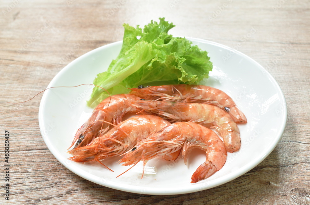 steamed river shrimp arranging with fresh lettuce on plate steamed river shrimp arranging with fresh lettuce on plate