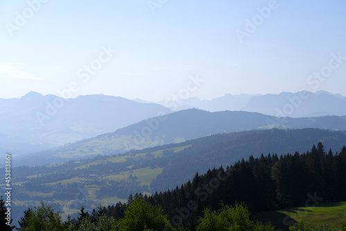 Beautiful scenic mountain panorama seen from local mountain Pf  nder on a sunny summer day. Photo taken August 15th  2021  Bregenz  Austria.