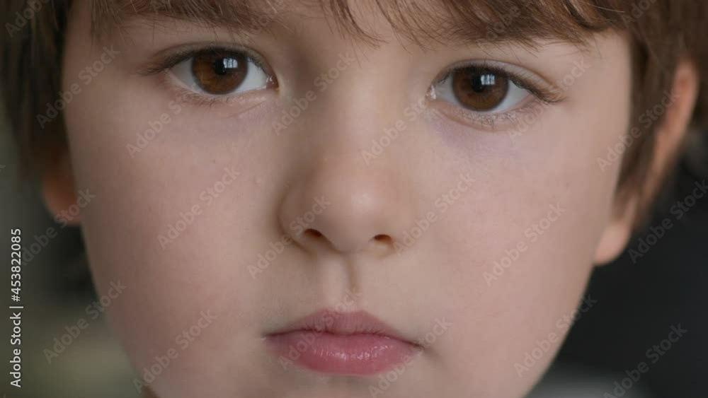 Portrait Little Child Boy Looking at Camera. Young Serious Thinking Curiosity Child Looking at Camera. Closeup. Indoors. Sad Kid Boy Portrait. Face Serious Contemplative Child. Portrait Little Child Boy Looking at Camera. Young Serious Thinking Curiosity Child Looking at Camera. Closeup. Indoors. Sad Kid Boy Portrait. Face Serious Contemplative Child.