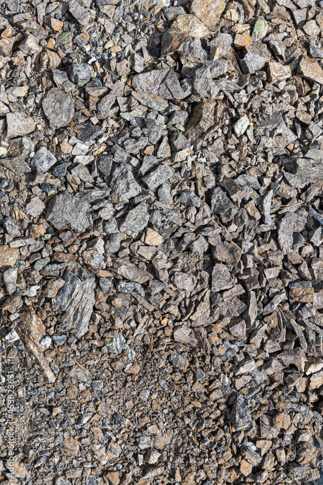 A beautiful texture of gray broken stone. Vertical A beautiful texture of gray broken stone. Vertical