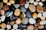 Polished beach pebbles. Nature background image with natural color pattern