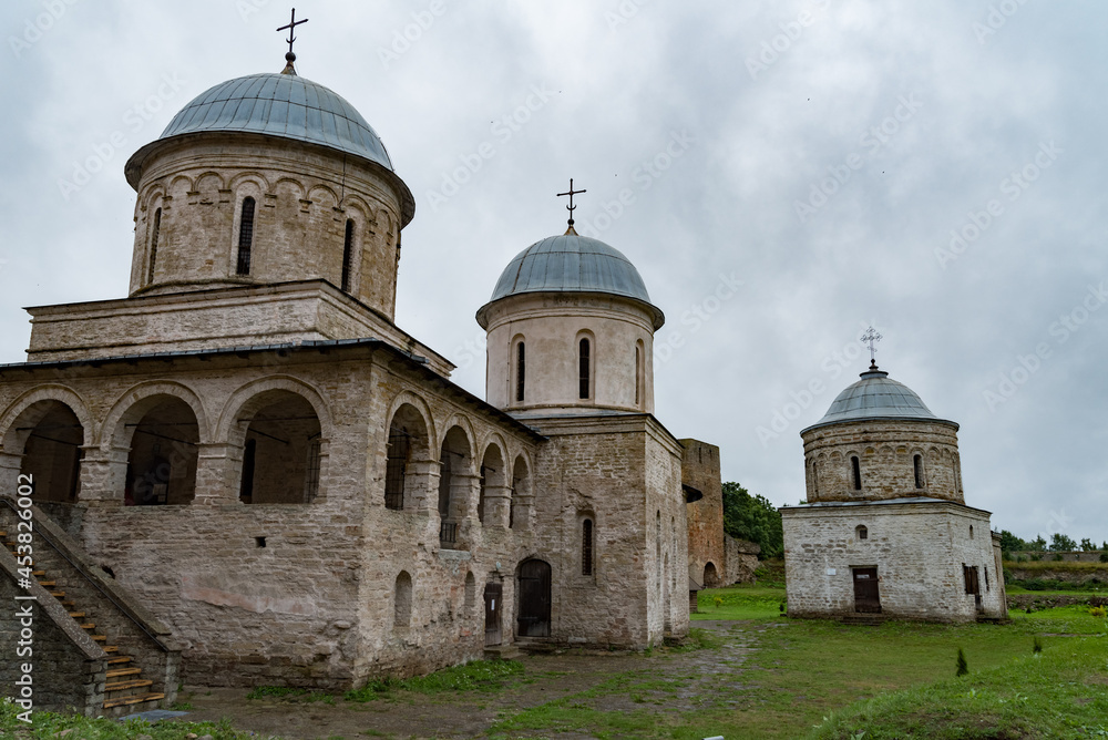 Ancient Church of Saint Nicholas and Church of Dormition of the Mother of God on territory of Ivangorod Fortress that was built in 1492. Ivangorod, Russia