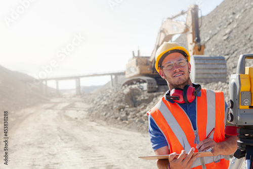 Fotografi Workers and businessman talking in quarry