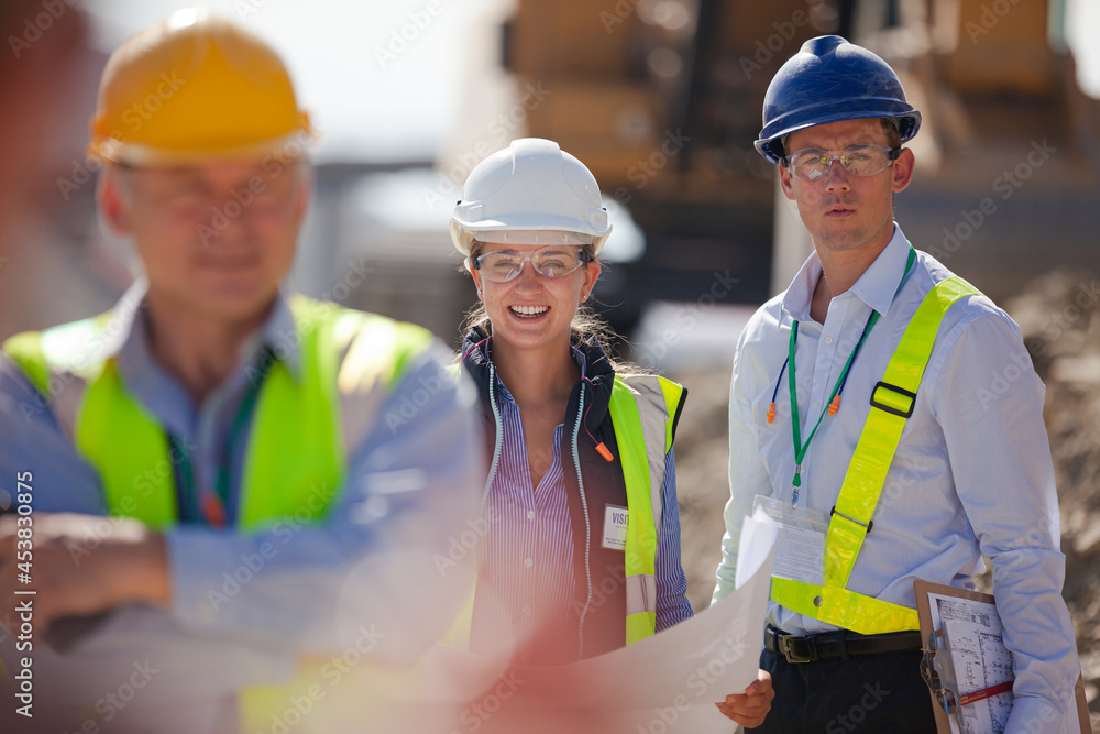 Worker holding clipboard on site Worker holding clipboard on site