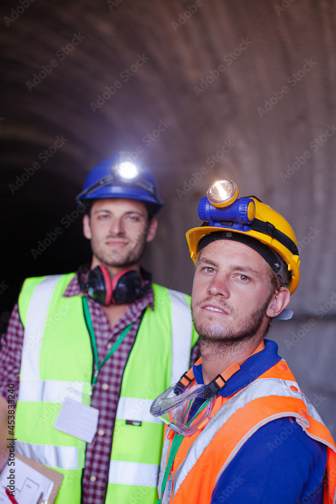 Business people talking in quarry Business people talking in quarry