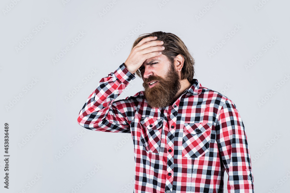 he is so tired. brutal caucasian guy with moustache. bearded man wear shirt. brutal man feeling pain. male health care. Migraine due to magnetic storms. mature hipster with beard has headache he is so tired. brutal caucasian guy with moustache. bearded man wear shirt. brutal man feeling pain. male health care. Migraine due to magnetic storms. mature hipster with beard has headache