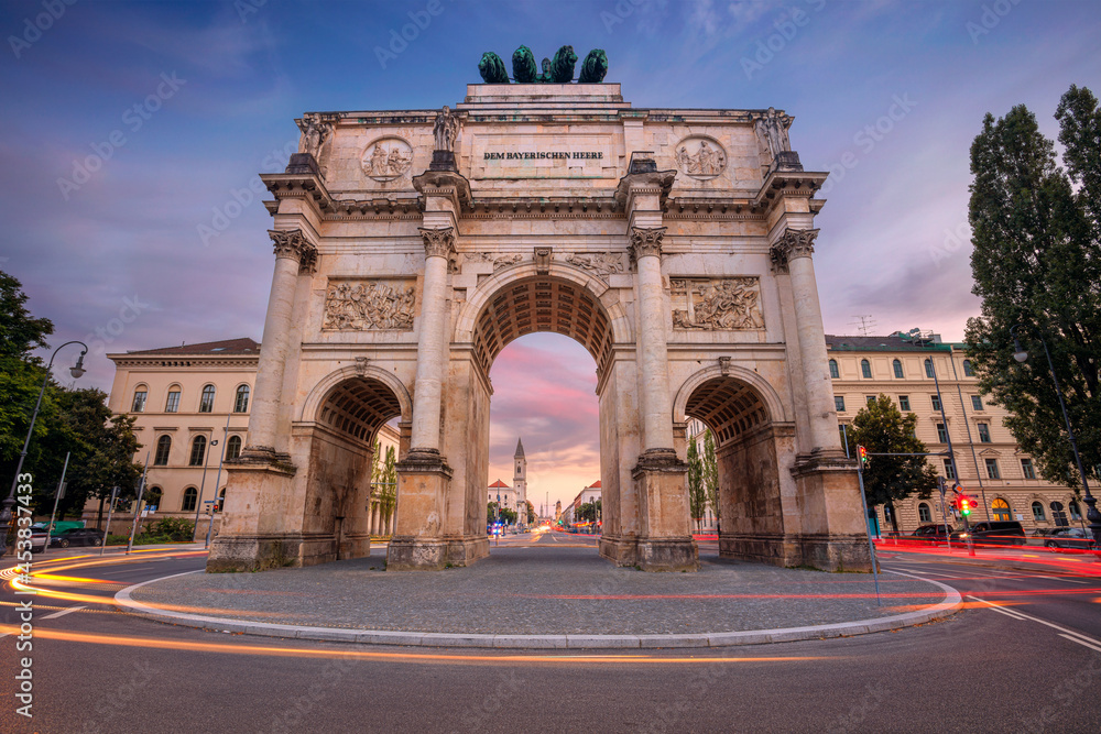 Munich, Germany. Cityscape image of Munich, Bavaria, Germany with the Siegestor at summer sunset.