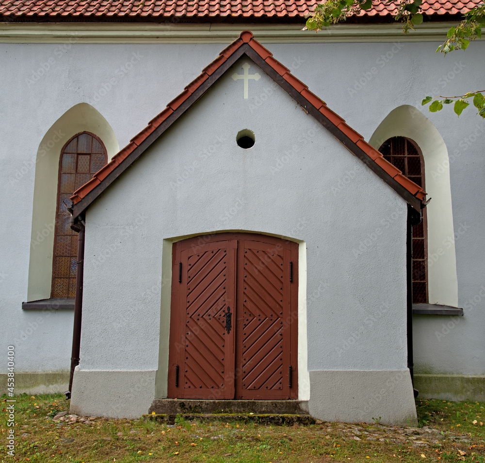 Φωτογραφία Built in 1603 in the Gothic style of fieldstones, plastered, the Catholic church of Saint Joseph in the village of Nawiady in warmia in Poland