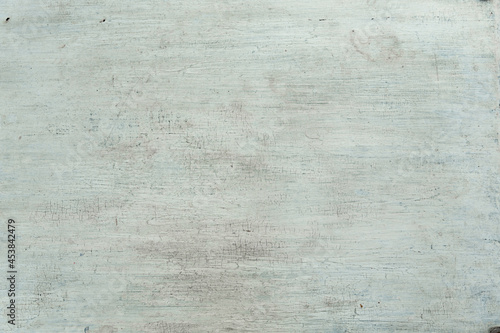 Weathered cracked paint background. Grunge white vintage texture pattern for overlaying artwork.