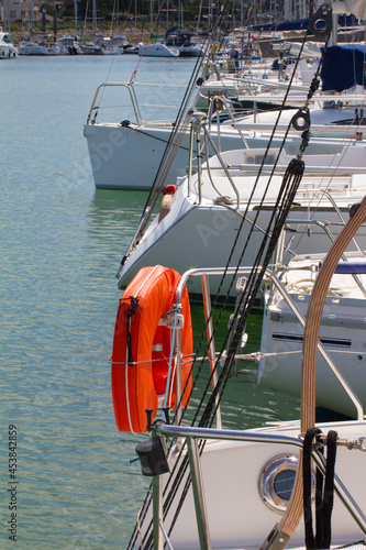 yacht sailing boat harbour for sports, vacation, escape and cruise