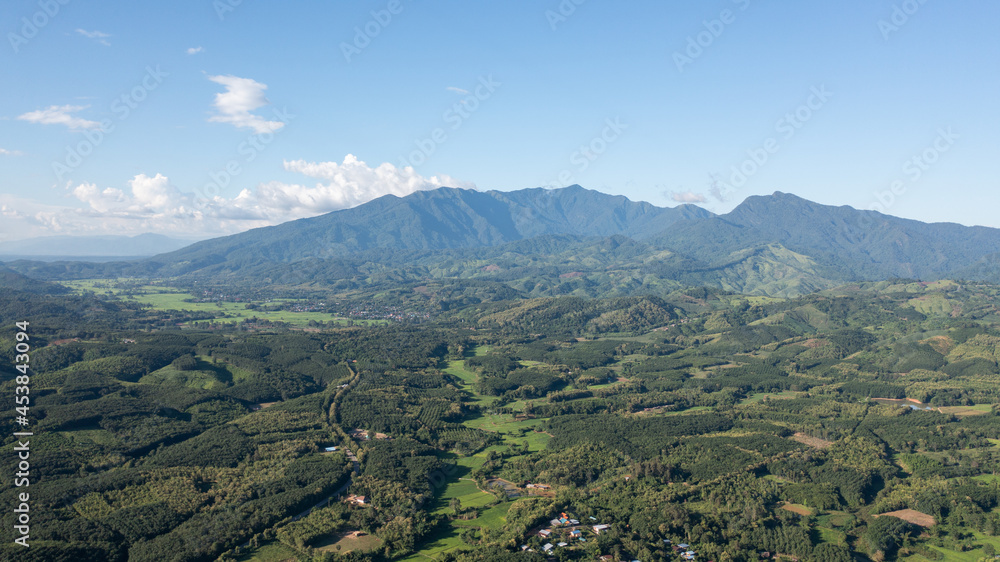 An aerial view of beautiful forest and mountain views. on a clear day Famous mountains of Nan Province, Northern Thailand, Doi Phu Kha