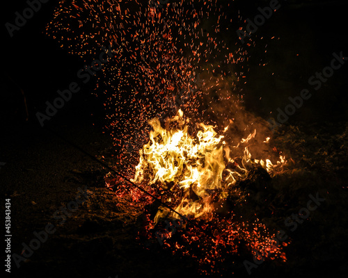 Chinese hungry ghost festival burning flame fire glowing ashes firefly colourful variety prayer paper joss money fake currency joss stick mini fag food fruit photo