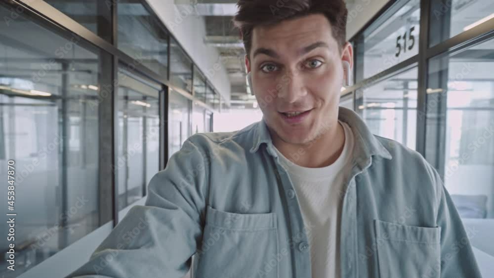 Handsome office worker talking to colleague online by conference call, business Handsome office worker talking to colleague online by conference call, business