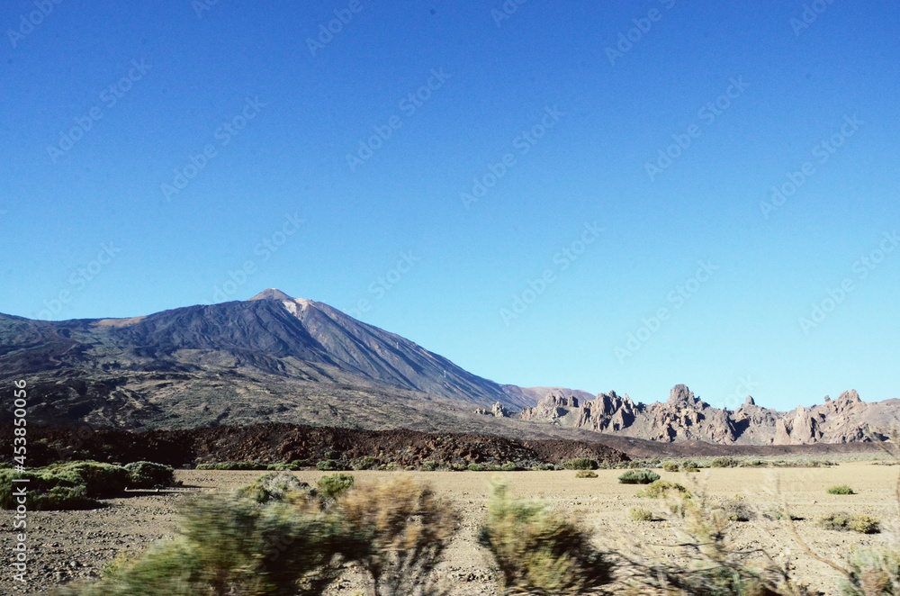 TENERIFE, SPAIN: Scenic landscape view of the Teide volcano natural park TENERIFE, SPAIN: Scenic landscape view of the Teide volcano natural park