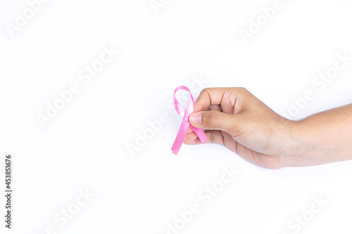 hand holding pink ribbon, breast cancer, white background