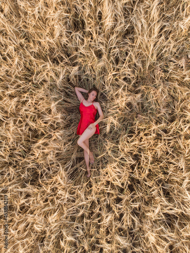 Aerial view of woman in red...