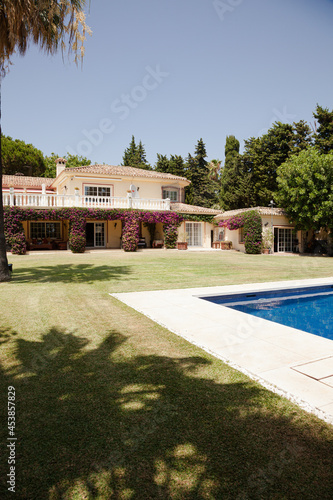 Luxury lap pool and Spanish villa © KOTO
