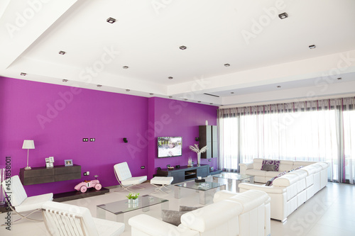 Fototapeta Naklejka Na Ścianę i Meble -  Purple wall in luxury living room