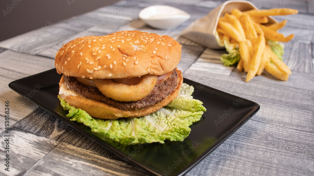 hamburger and sauce and fried potatoes hamburger and sauce and fried potatoes