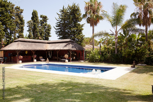 Wallpaper Mural Luxury patio overlooking swimming pool Torontodigital.ca