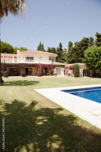 Luxury lap pool and Spanish villa © KOTO