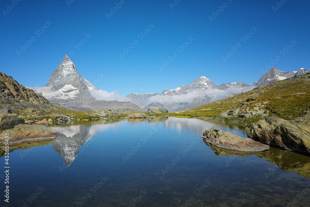 Mountain Matterhn in Switzerland in Europe with lake