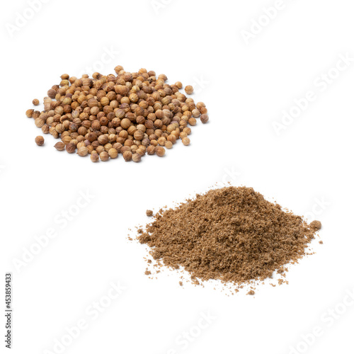 Heap of dried coriander seed  and ground coriander isolated on white background  