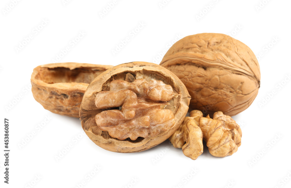 Fresh ripe tasty walnuts on white background Fresh ripe tasty walnuts on white background