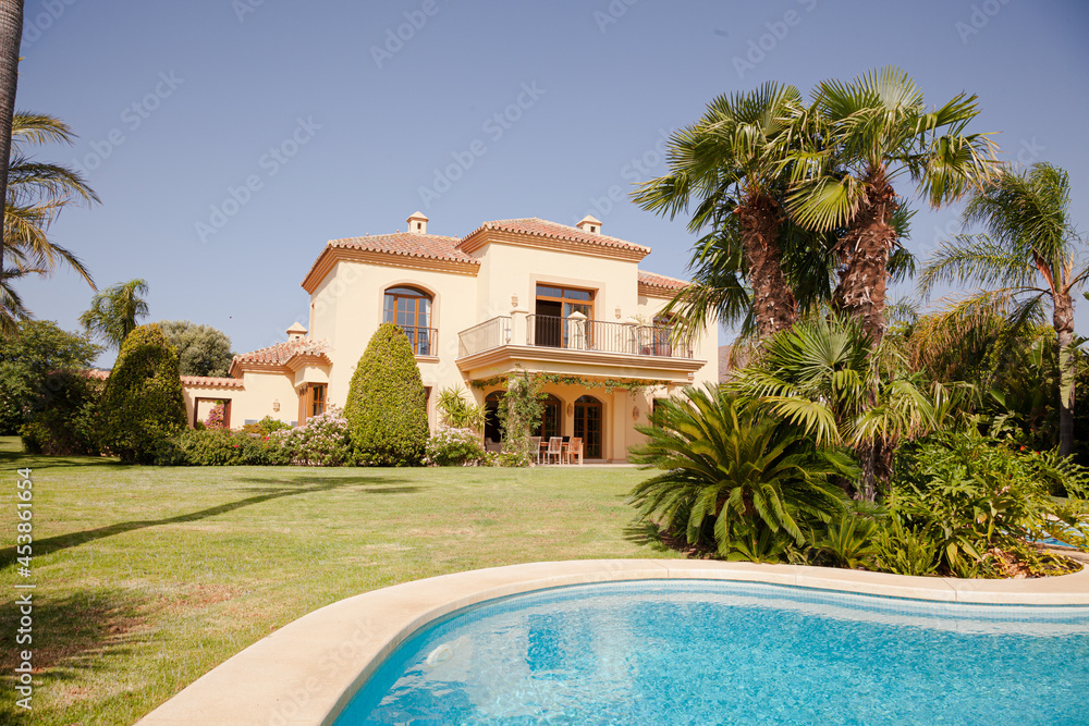 Swimming pool and Spanish villa