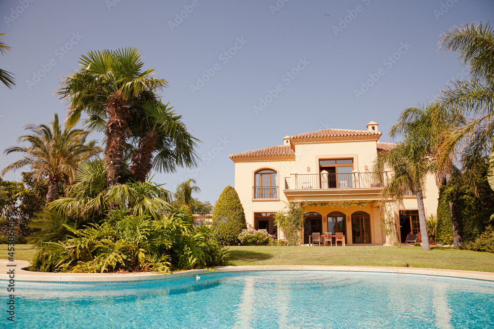 Swimming pool and Spanish villa - obrazy, fototapety, plakaty 