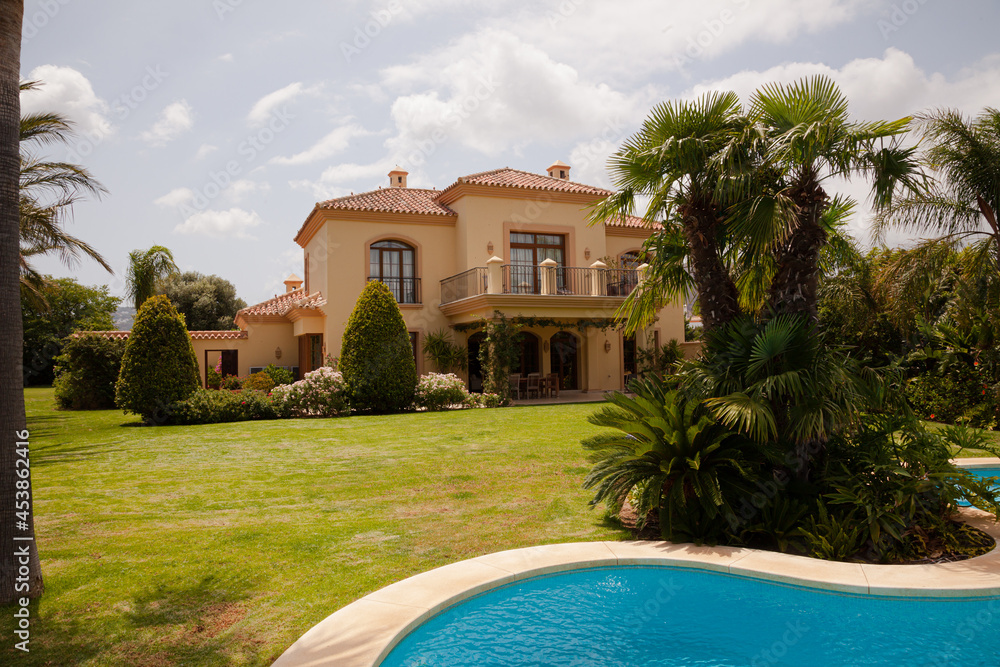 Luxury swimming pool and Spanish villa