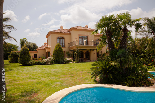 Luxury swimming pool and Spanish villa © KOTO