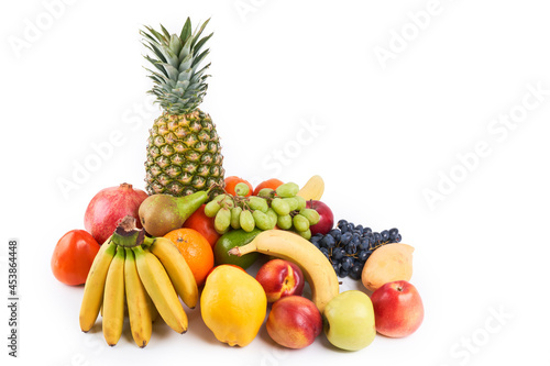 Fototapeta Naklejka Na Ścianę i Meble -  Mix of fresh juicy colorful exotic tropical fruits on white background