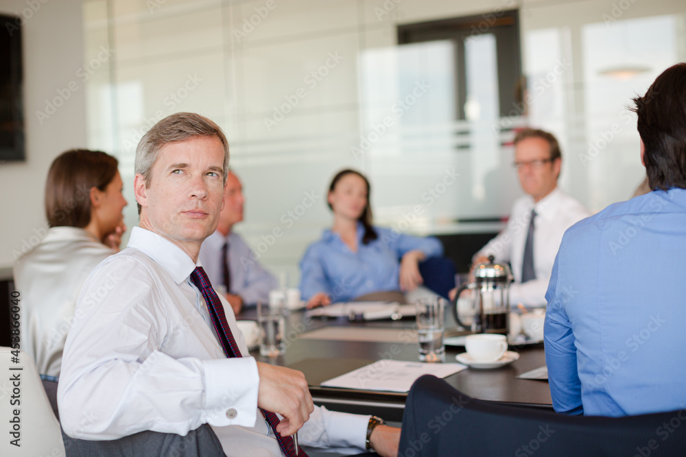 Business people sitting in meeting Business people sitting in meeting