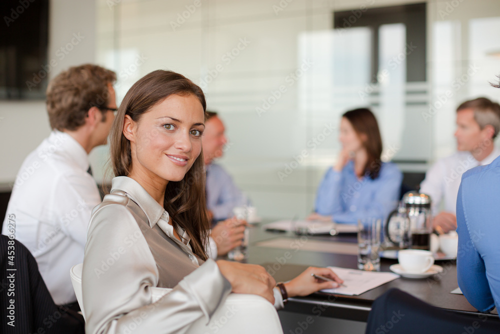 Business people sitting in meeting Business people sitting in meeting