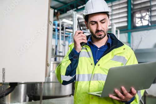 technician engineer working to maintenance a construction equipment industry, production technology in plant factory, man working to safety control system in manufacturing product factory