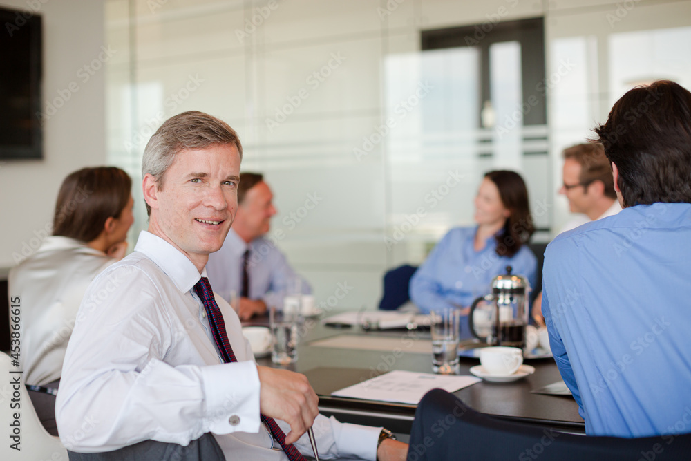 Business people sitting in meeting Business people sitting in meeting