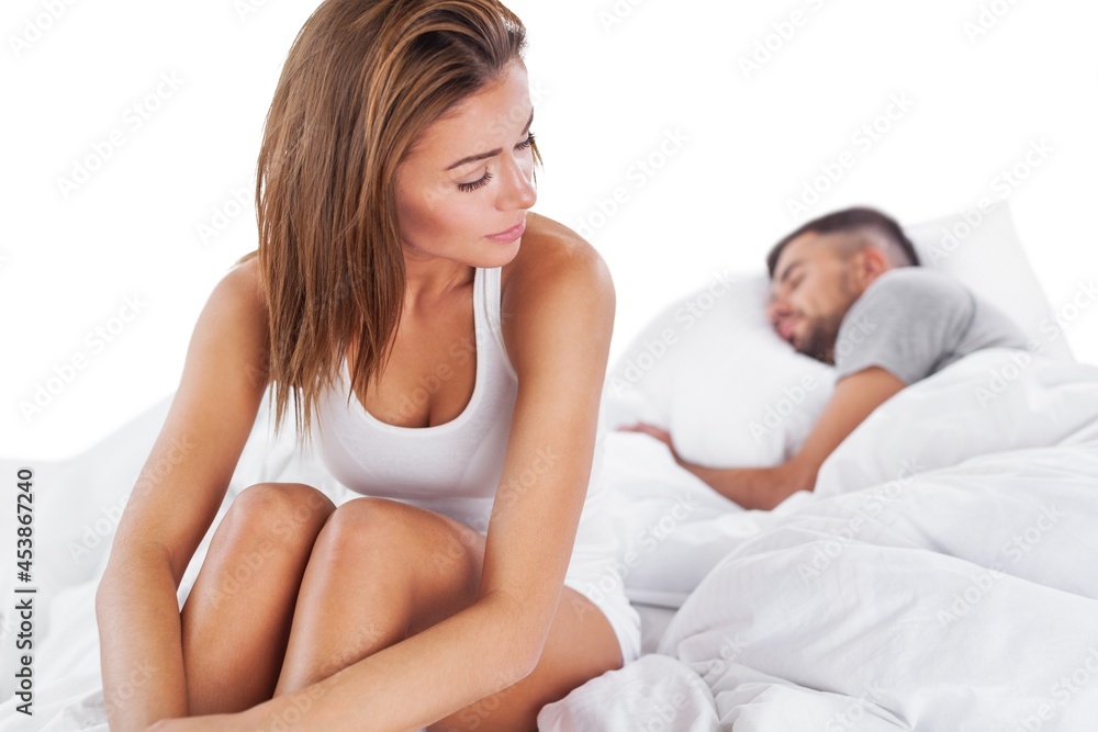 Young couple in bed.