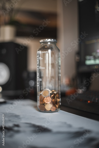 a bottle filled with money
