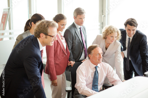 Business people smiling in office