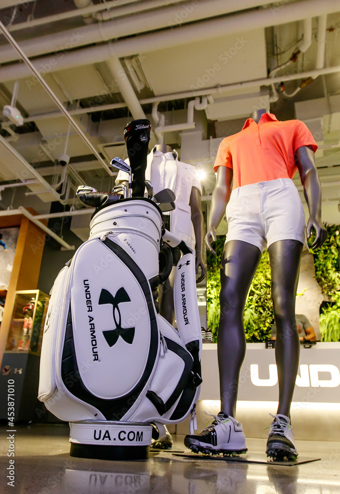 Golf bag and clubs next to headless mannequins wearing golf outfits in Under  Armour store inside Prudential Center in Boston. Stock Photo | Adobe Stock