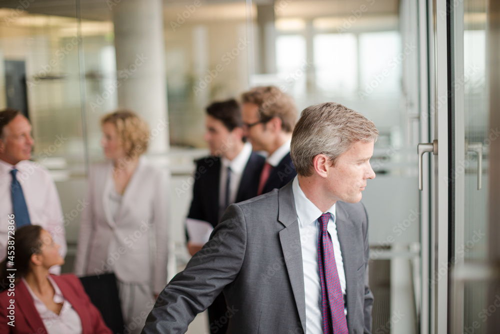 Business people talking in meeting