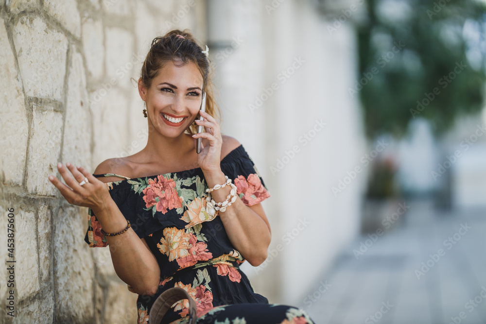 Woman Using A Smartphone And Enjoying Summer Vacation Woman Using A Smartphone And Enjoying Summer Vacation